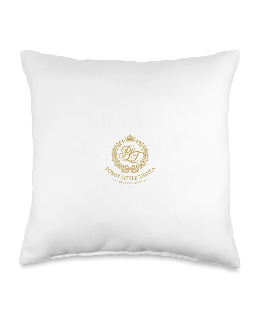 Poshy Little Things crest on a white throw pillow